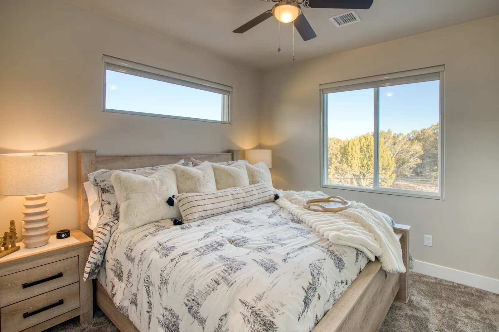 Second bedroom with king bed and forest views