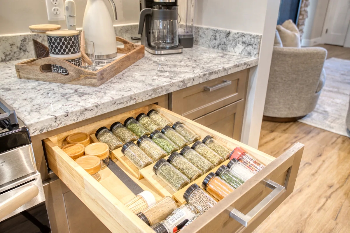 Fully stocked spice drawer in the Bluff Retreat kitchen