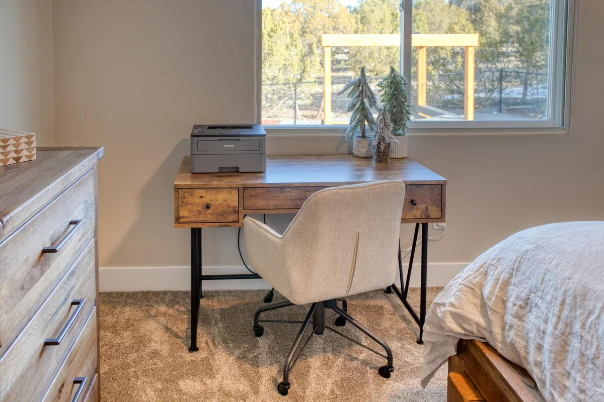 Desk workspace with chair in the primary bedroom
